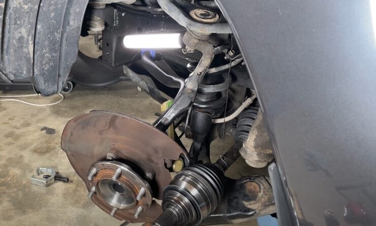 A car displaying a brake and brake disc